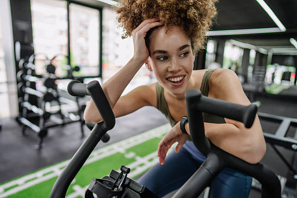 istock Confident Woman Keeping Fit in Modern Gym 2219492035