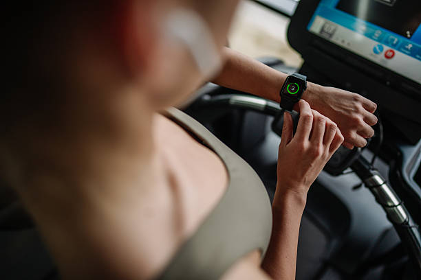 istock Focused Athlete Monitoring Progress on Smartwatch 2219493022