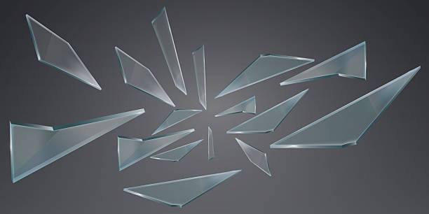 istock Shards of clear glass fly across a transparent background with realistic sharp edges and light reflections. 2219503638