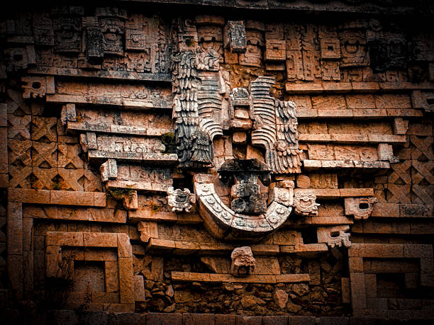Buddhist stone carvings in the Arhat cave at the Oriental Buddha Capital (Dongfang Fodu) in Leshan, China, known for its intricate rock carvings of numerous Buddha statues, bodhisattvas, and arhats. It is considered the fifth-largest Grotto group in China and a significant attraction alongside the famous Leshan Giant Buddha.