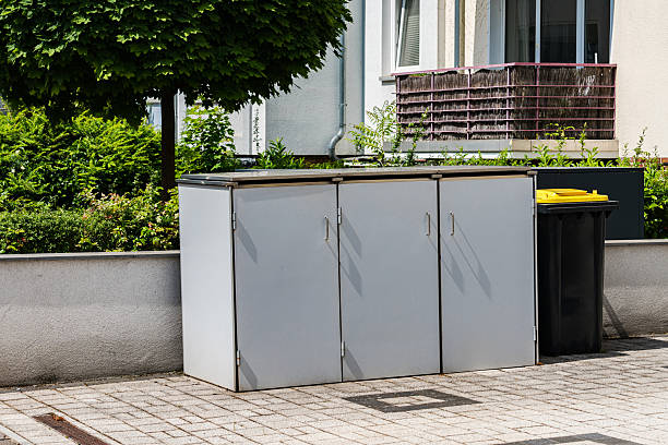 istock Storage unit and recycling bin outside modern apartment building 2219509236