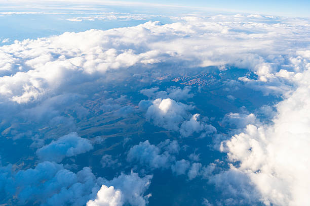 istock Cloudscape with cloudy weather. Cloud and cloudscape aerial sky. Aerial cloudscape view covered with cloud. Aerial cloudy sky view. Cloud view from plane. Sky in cloud. Cloudy skyline 2219509923
