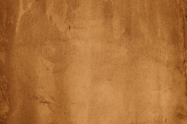 istock Textured brown old street wall with in different brown  shades 2219510355