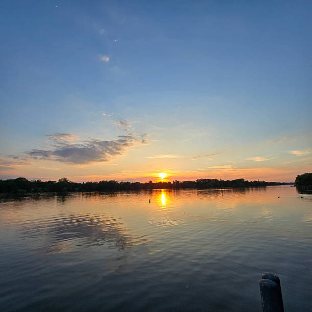 istock A Beautiful and Tranquil Sunset Over the Serene and Calm Waters, with a Peaceful Evening Sky 2219511293