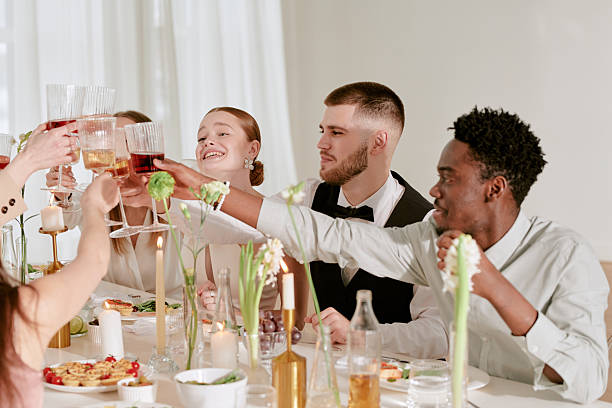 istock Diverse Young Adults Toasting Glasses Celebrating Wedding Reception Together 2219513072