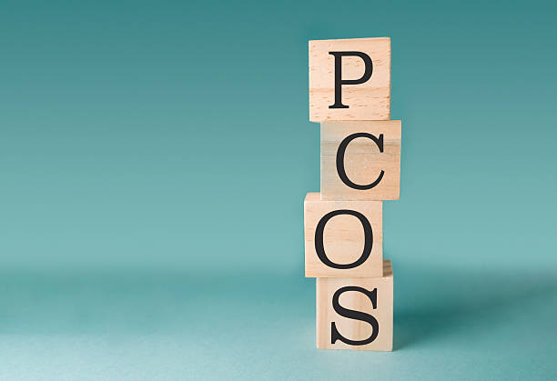 istock Stack of wooden blocks with the letters PCOS on top 2219525546