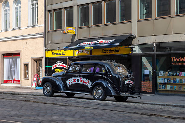 Helsinki, Finland - Jun 8th 2025: A historical Volvo PV800 car is used as an advertisement of a restaurant in Helsinki.