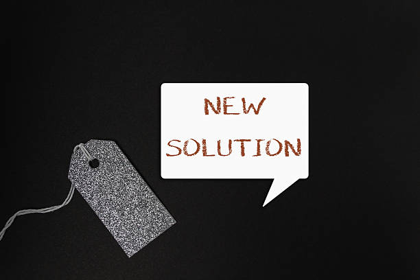 istock Tag with the word new solution written on it 2219526686