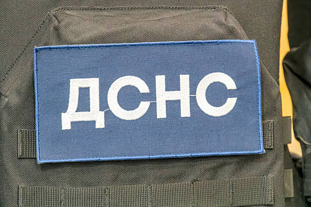 istock Rectangular, rounded corners, dark color, arm patch or emblem, Rescue Service of Ukraine, white text, Cyrillic script, possibly official 2219531944