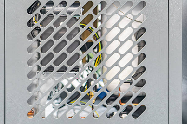 istock Close-up view of a silver honeycomblattice structured metal object with depth and multiple layers, no text, darker background, emphasizing three-dimensional quality 2219533125