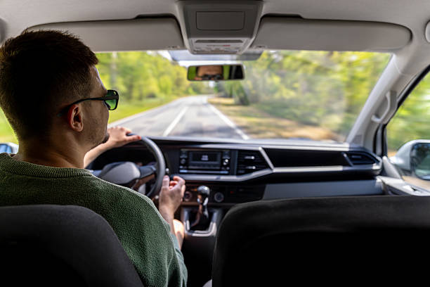 istock Focused driving. Spring road trip. Interior car view. 2219533374