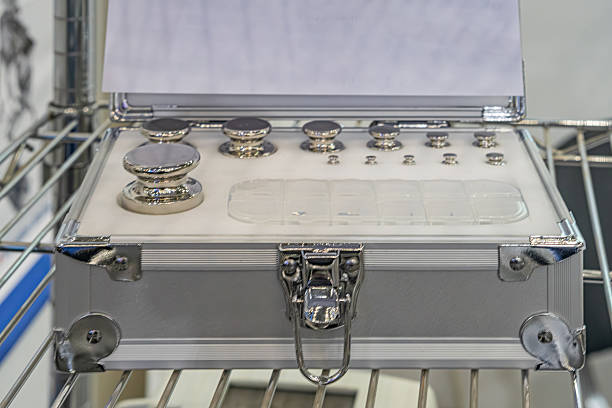 Silver, combination lock suitcase on metal shelving, personal care items, grooming tools razors, ointment, small book or manual in pocket, neatly arranged contents