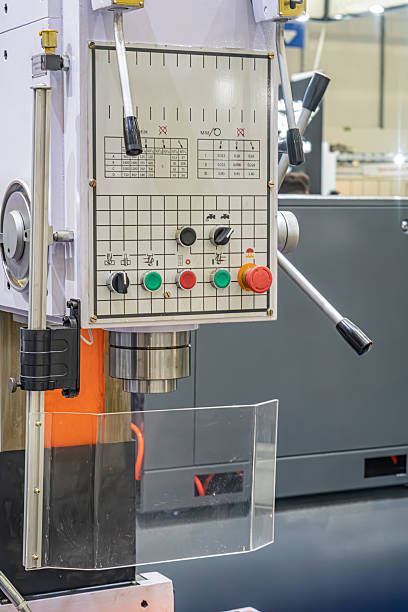 istock Image of industrial CNC millingdrilling machine in a manufacturing environment Robust construction with visible components like spindle, control panel, and gantry system Operators arm partially v 2219533942