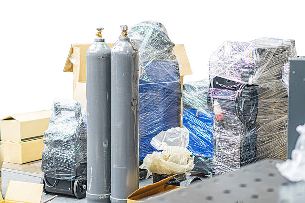 istock Industrial scene with machinery, metallic structures, plastic sheeting, and label box in a cluttered environment Indoor, evenly lit factory or workshop Candid photography style without people or te 2219535443