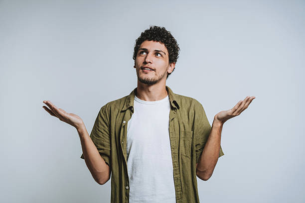 istock Portrait of a young man gesturing studio photo 2219537095