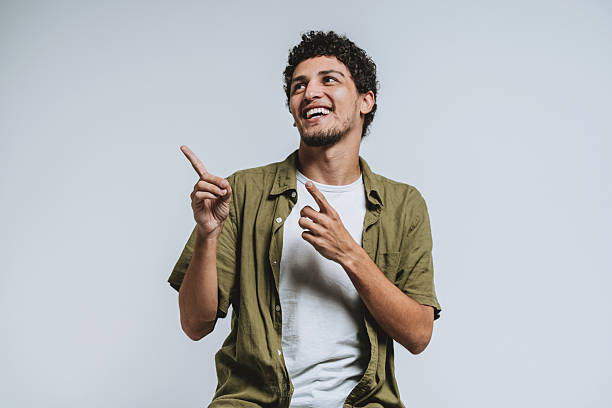 istock Portrait of a young man gesturing studio photo 2219537097