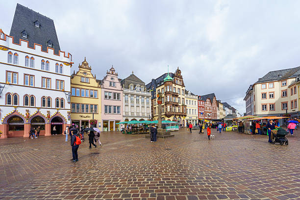 Trier, Germany - October 11, 2024: Scene of the Hauptmarkt square, with various buildings, locals and visitors, in Trier, Rhineland-Palatinate, Germany