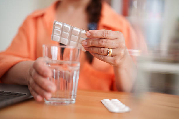 istock Close-up of Woman's Hand Holding Medication 2219541606