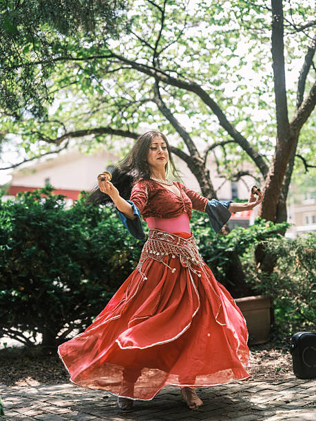 istock Belly dancer performing in the garden 2219543422