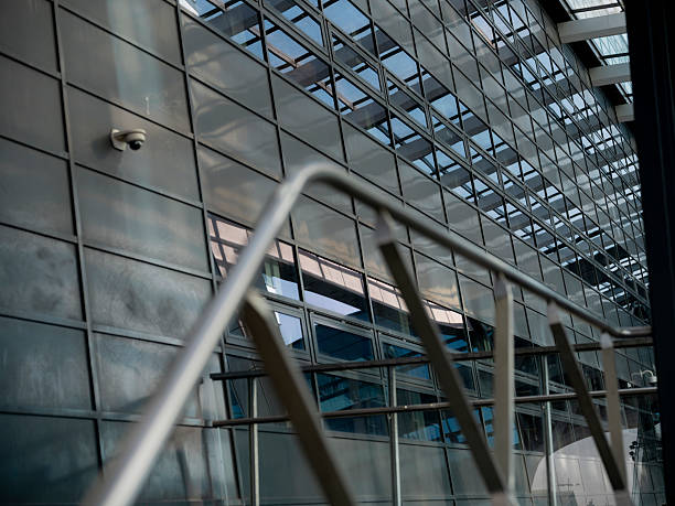 istock glass atrium with steel railings and skylight with a prominently placed security camera 2219544769