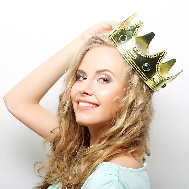 istock young lovely woman in crown 2219545888