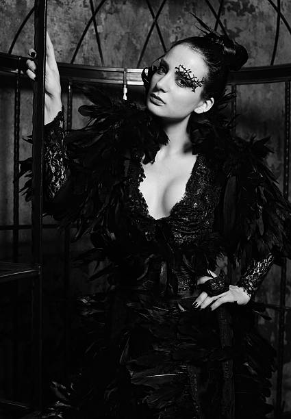 istock Fashion model  posing in steel cage. 2219547039