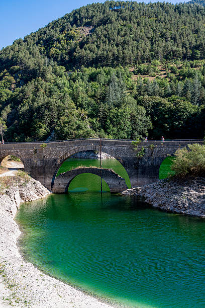 istock Arched Stone Bridge over Lake San Domenico, Abruzzo 2219555796