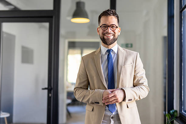 istock Businessman Exuding Confidence in a Welcoming Office 2219556608