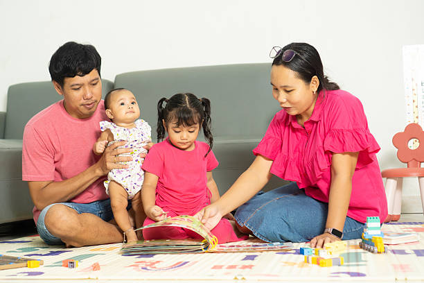istock Parents and Kids Playing and studying 2219556844