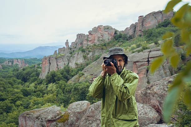 istock Mature Man Bird Watching From Belogradchik Rocks 2219557462