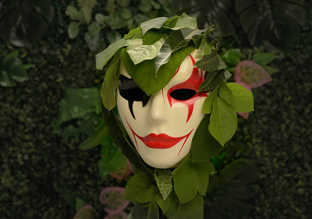 Collecting mask. Carnival decoration isolated on white wallpaper. Small Witch larva head. Disguise for the fifth season. Hanger for the wall. Saulgau.