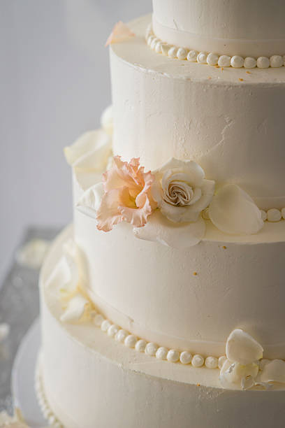 istock Elegant White Wedding Cake with Soft Floral Detail 2219567410