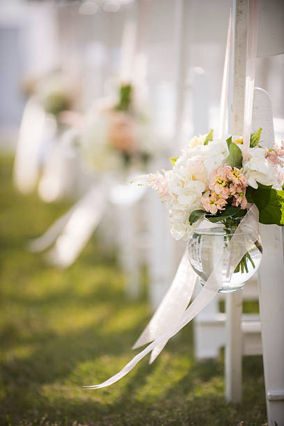 istock Summer Wedding Aisle Decor with Coastal Floral Arrangement 2219567414