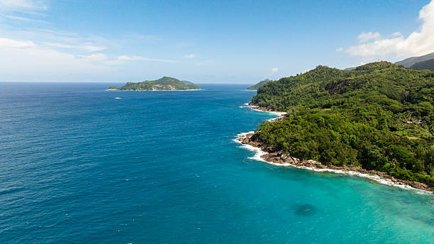 istock Seascape with tropical beach and blue ocean. Seychelles. 2219570478