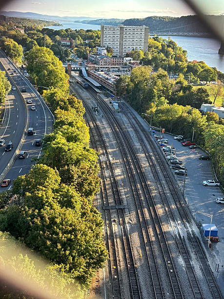 istock Aerial View of Poughkeepsie Train Tracks and Hudson River 2219576280