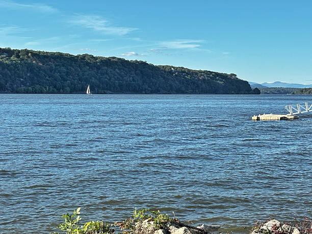istock Hudson River with Sailboat and Distant Mountains in Poughkeepsie 2219576333