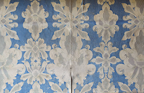 istock Old wallpaper on the wall. Old wallpaper for texture or background. 2219578458