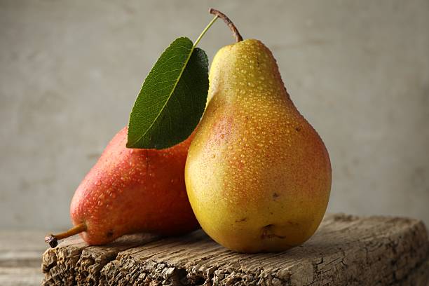 istock Ripe juicy pears on table against grey background, closeup 2219585391