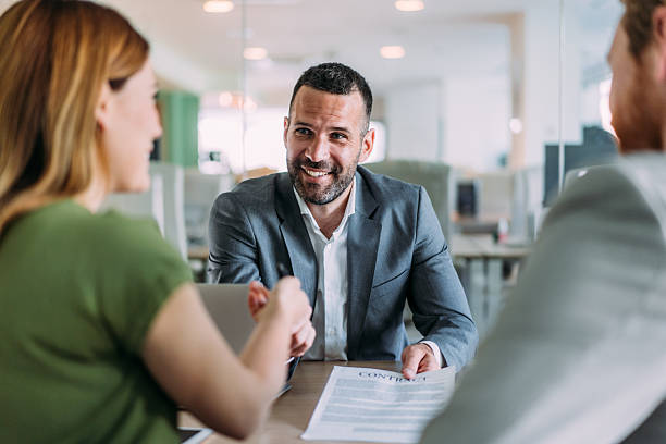 istock Business people signing a contract in the office. 2219587067