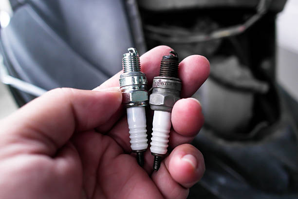 istock Two spark plugs comparison, one new and one used 2219588438