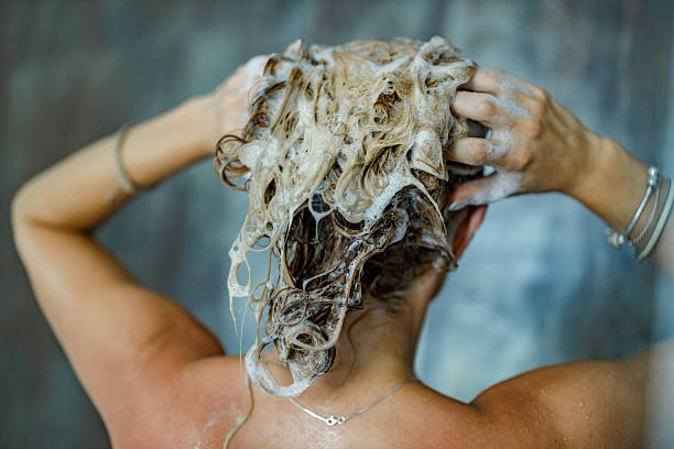 istock Washing hair with shampoo! 2219590850