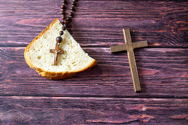 istock Lent season - Bread and cross 2219593233
