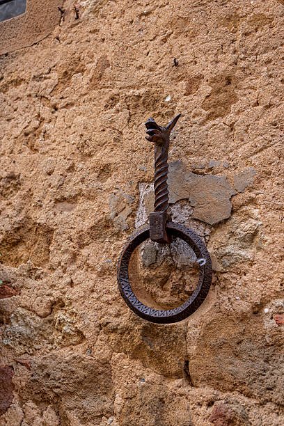 istock Medieval Iron Horse Ring on Stone Wall 2219604689