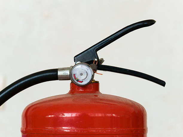 istock Fire extinguisher barometer with hose Closeup 2219606612