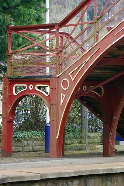 istock Footbridge over train track at station 2219607521