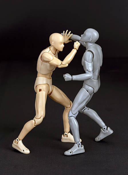 Attacker punches straight with the right. Defender dodges left, parries with right, then lands a quick left uppercut to the chin.