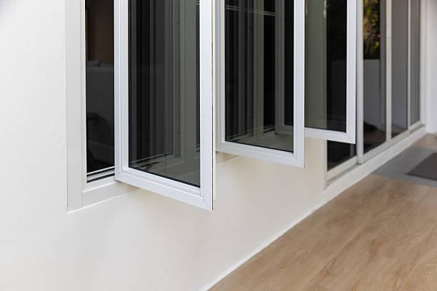 istock Three panel aluminium casement window stay on white wall. 2219608420