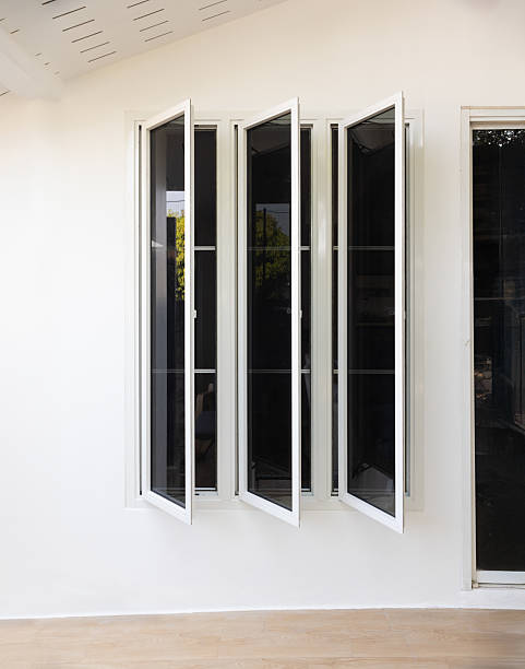 istock Three panel aluminium casement window stay on white wall. 2219608440