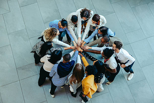 istock Group of colleagues in an introduction session showcasing unity 2219610339