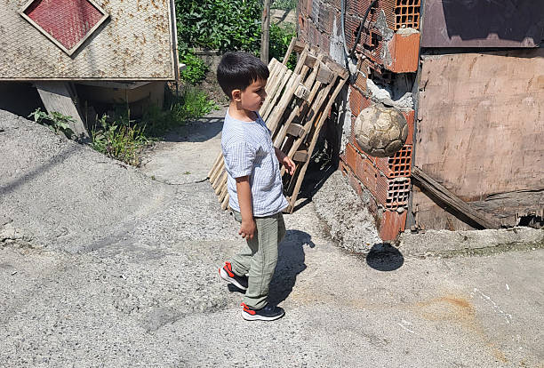Little boy with a ball at outdoors